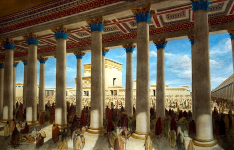 Huge pillars holding a roof are lined up in two rows and a stream of people can be seen at their bases throughout. The rest of the temple can be seen in the distance.